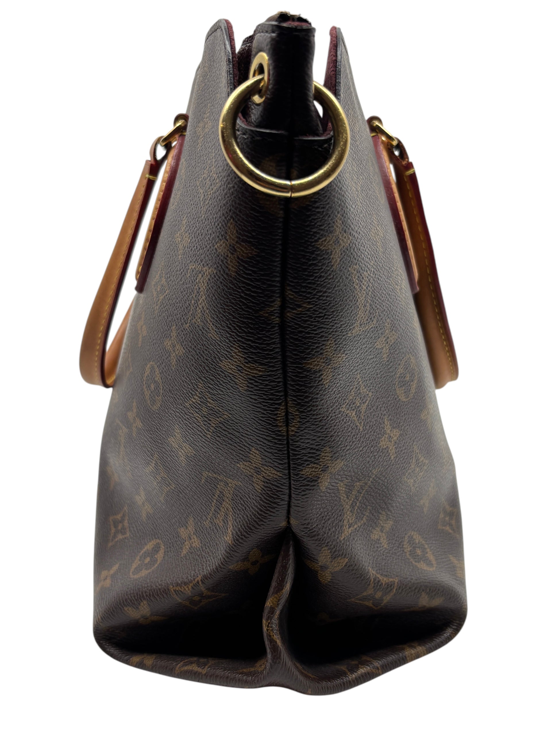 Posh Purse Co. Louis Vuitton Flower Zipped Tote side view showing monogram canvas, leather handles, and gold hardware.