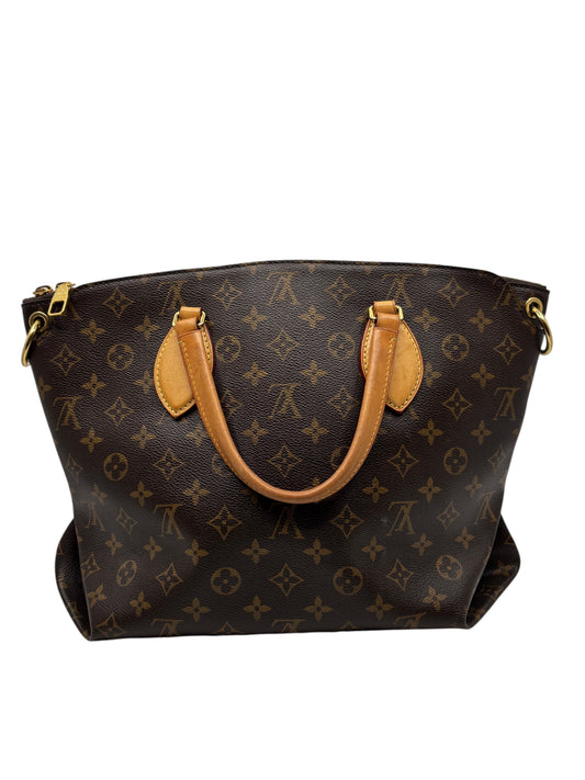 Posh Purse Co Louis Vuitton Monogram Flower Zipped Tote in brown canvas with tan leather handles and gold hardware.