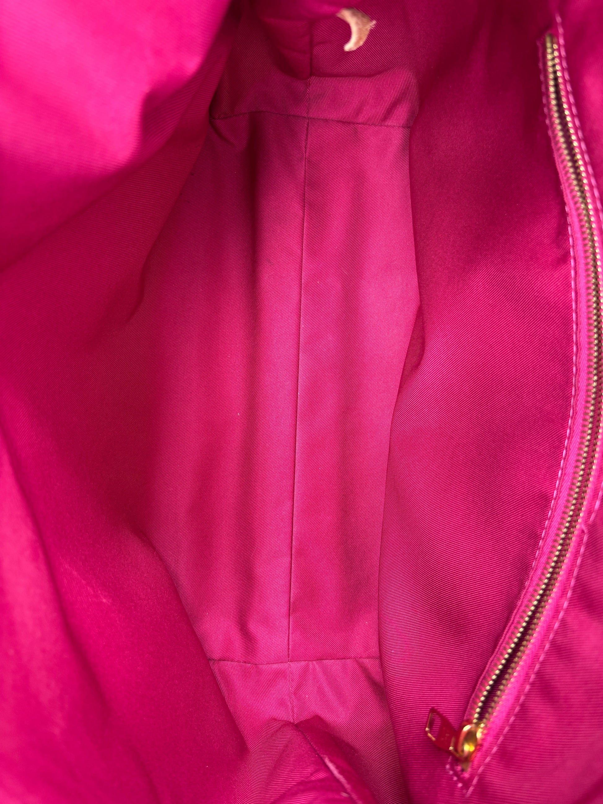 Posh Purse Co preloved Louis Vuitton Graceful hobo bag interior featuring vibrant pink textile lining and gold zipper