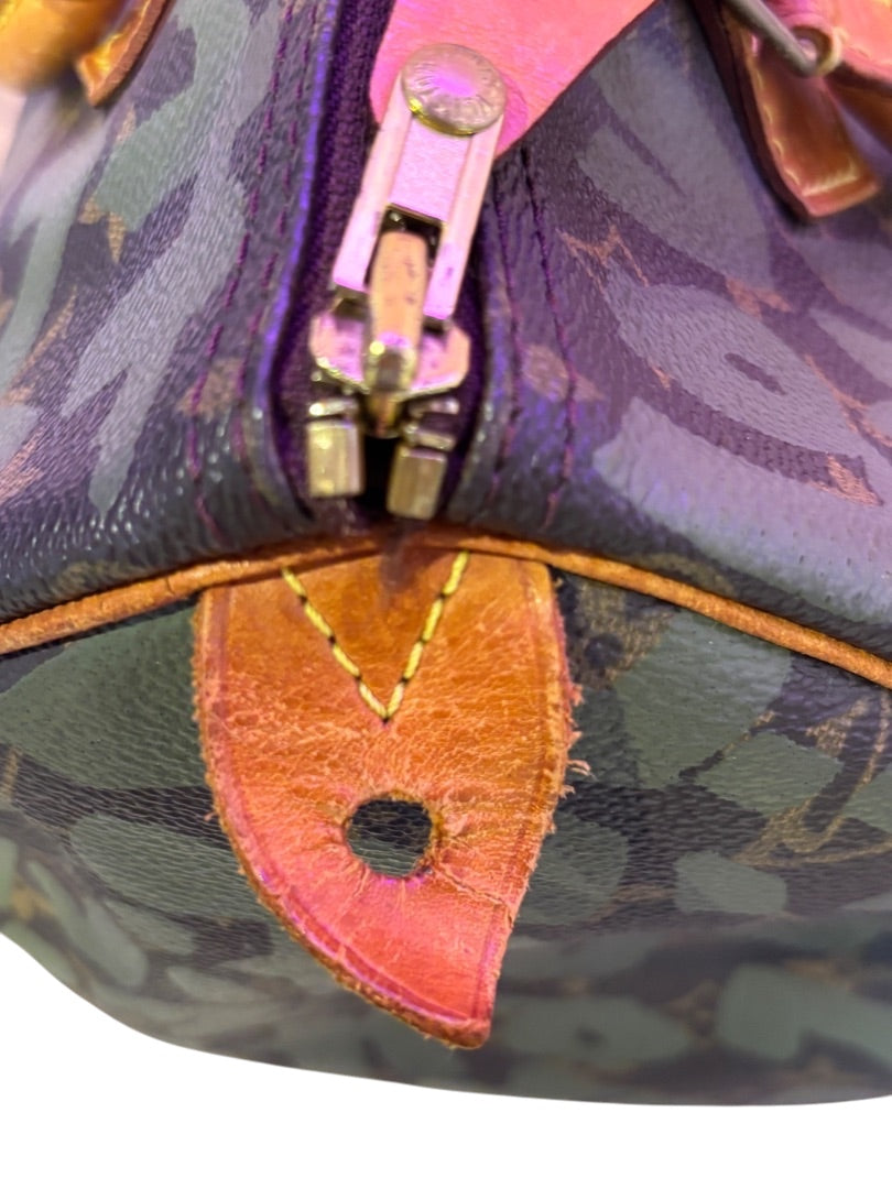 Posh Purse Co Louis Vuitton Graffiti Speedy bag with monogram canvas and leather trim. Close-up of zipper and handle attachment.