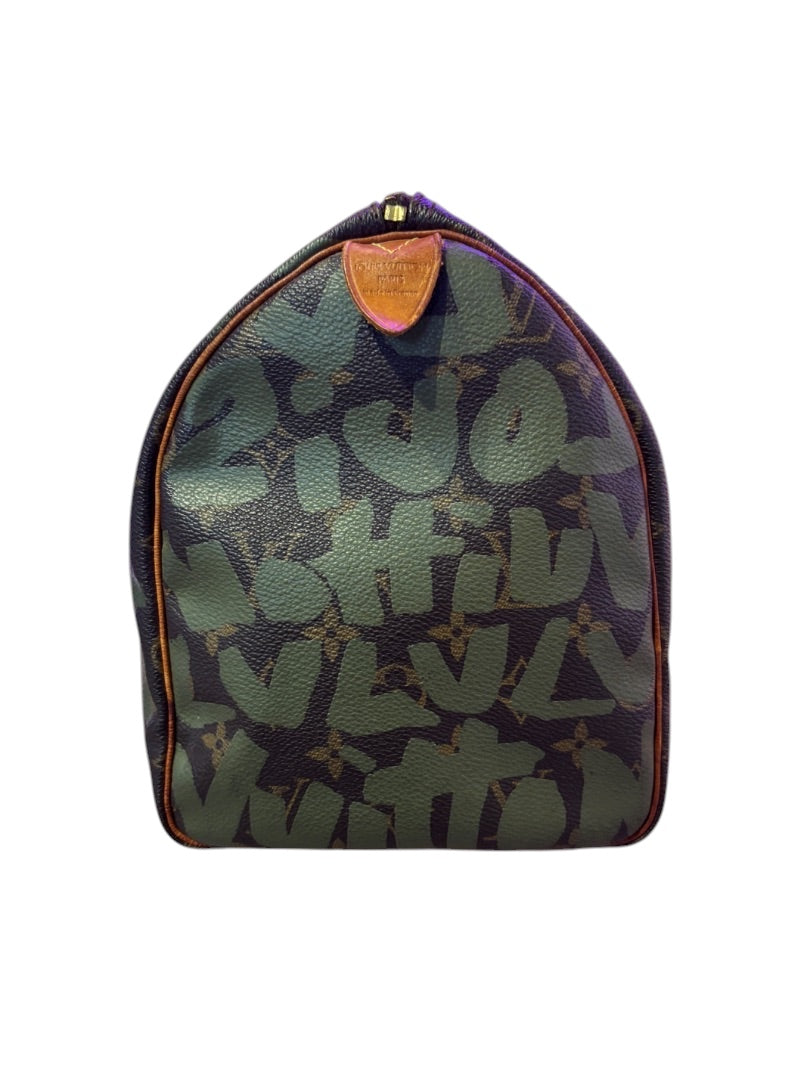 Posh Purse Co Louis Vuitton Graffiti Stephen Sprouse Speedy bag in coated canvas with green graffiti overlay on monogram. Natural leather trim and patina on handles.