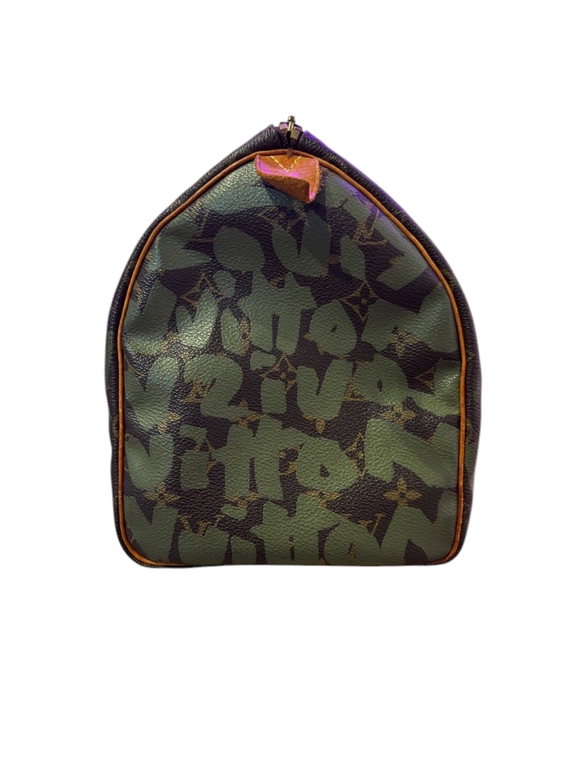 Posh Purse Co Louis Vuitton Graffiti Stephen Sprouse Speedy bag in brown monogram canvas with green graffiti overlay and leather trim.
