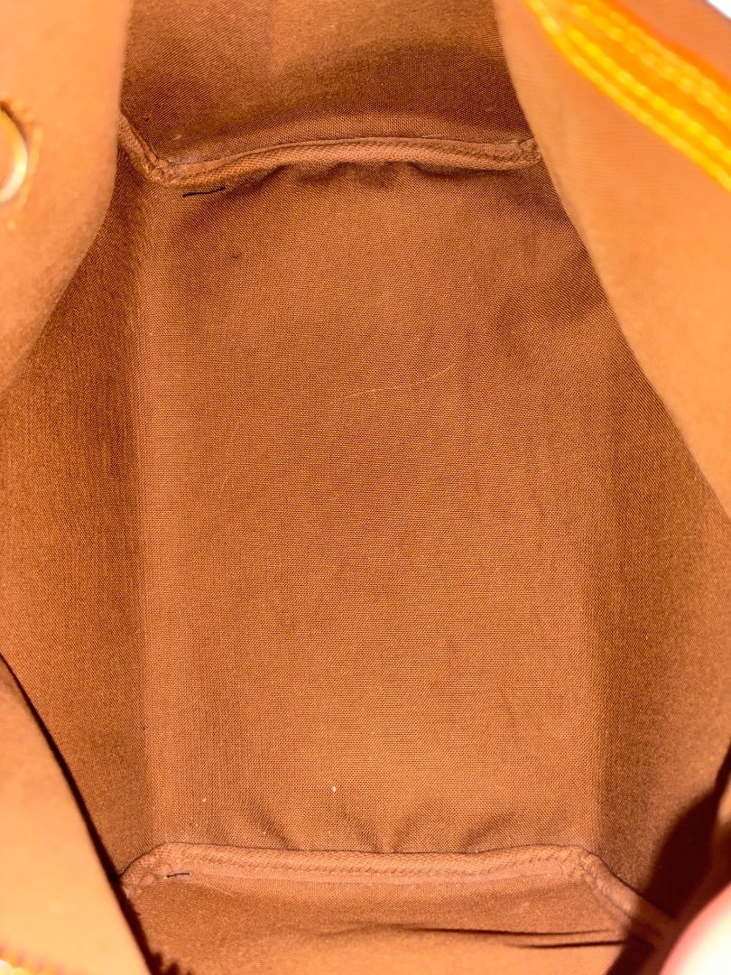Interior of Posh Purse Co. Louis Vuitton Graffiti Stephen Sprouse Speedy bag, brown canvas lining.