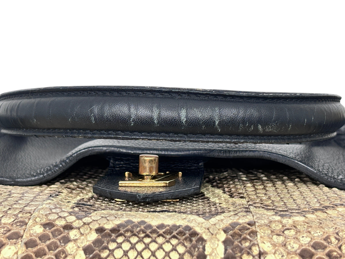 Posh Purse Co Louis Vuitton LockMe MM handbag featuring black leather handle with wear and exotic python skin detail