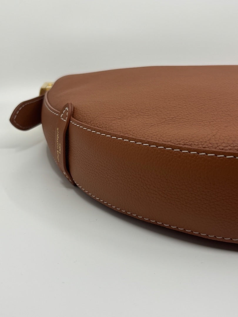 Posh Purse Co. Louis Vuitton Lowkey Cookie bag in brown pebbled leather with white stitching and gold hardware.