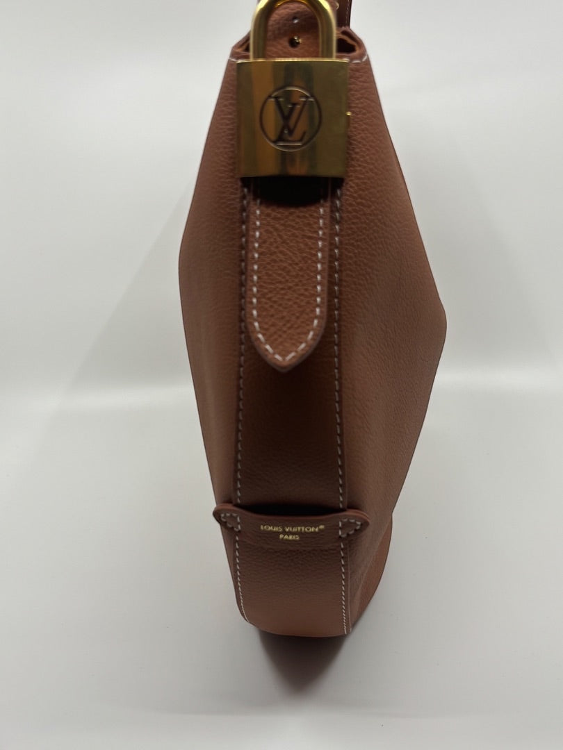 Posh Purse Co. Louis Vuitton Lowkey Cookie bag in brown pebbled leather with gold hardware and white stitching.