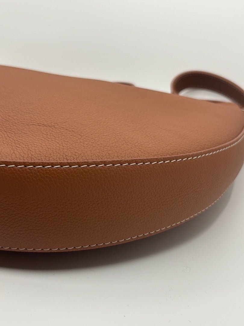 Posh Purse Co. Louis Vuitton Lowkey Cookie bag in brown pebbled leather with white stitching.