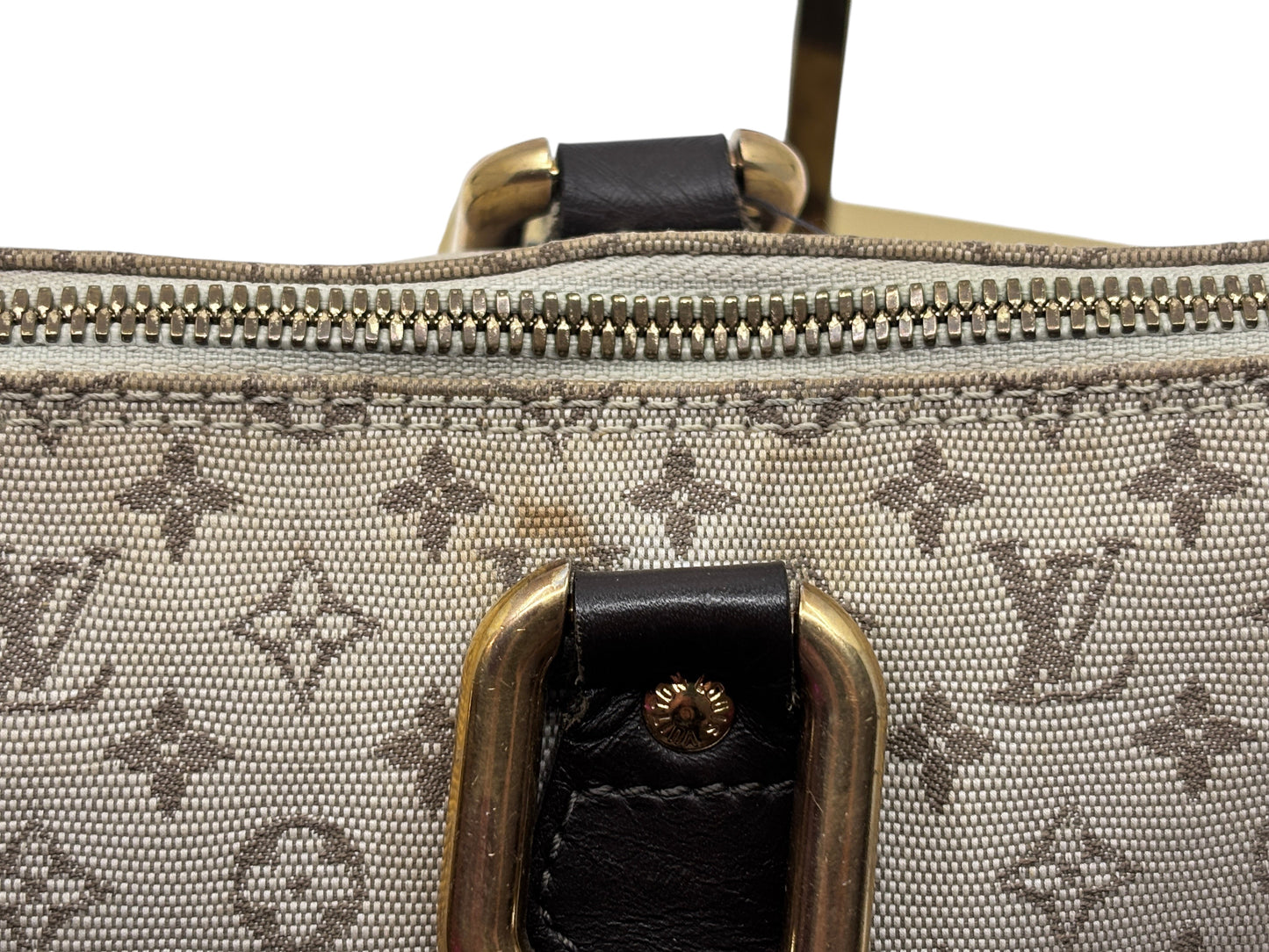 Posh Purse Co preowned Louis Vuitton Long Mini Lin bag showing monogram canvas, leather trim, and gold hardware detail