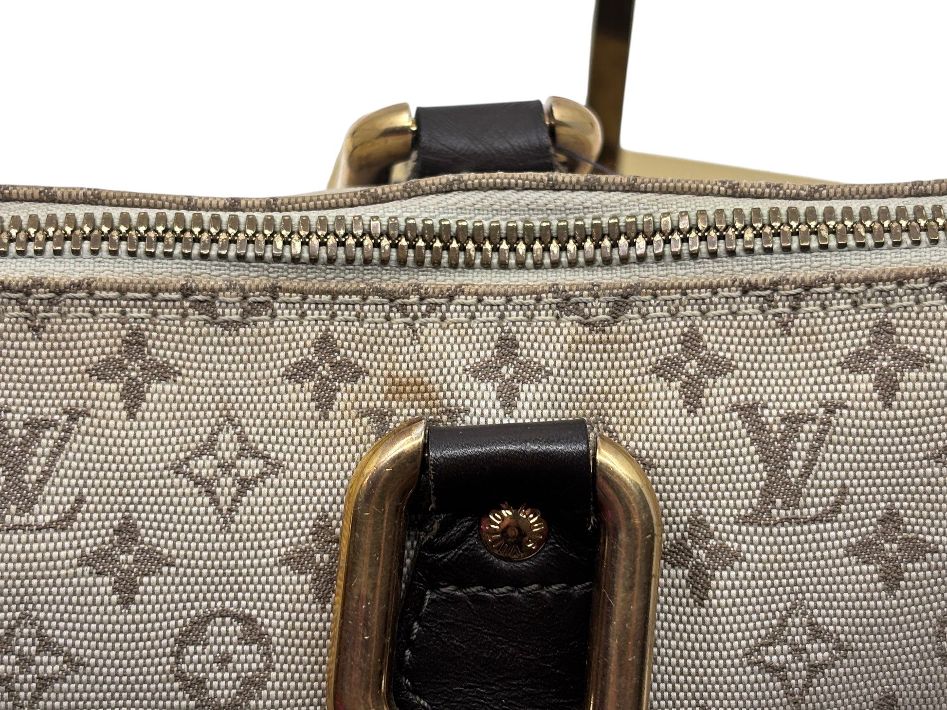 Posh Purse Co preowned Louis Vuitton Long Mini Lin bag showing monogram canvas, leather trim, and gold hardware detail