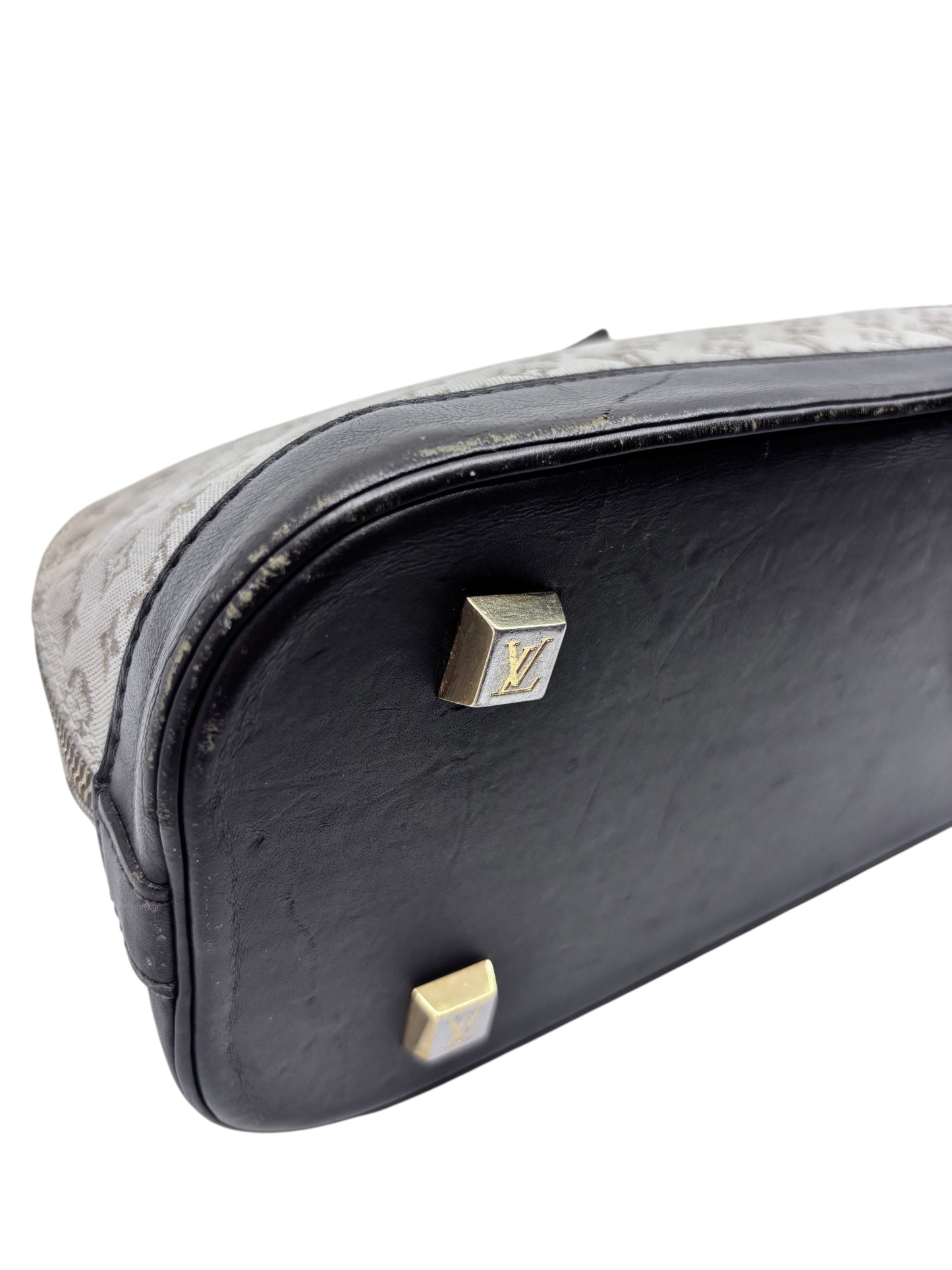 Posh Purse Co preloved Louis Vuitton Long Mini Lin bag base with black leather trim and gold tone metal feet