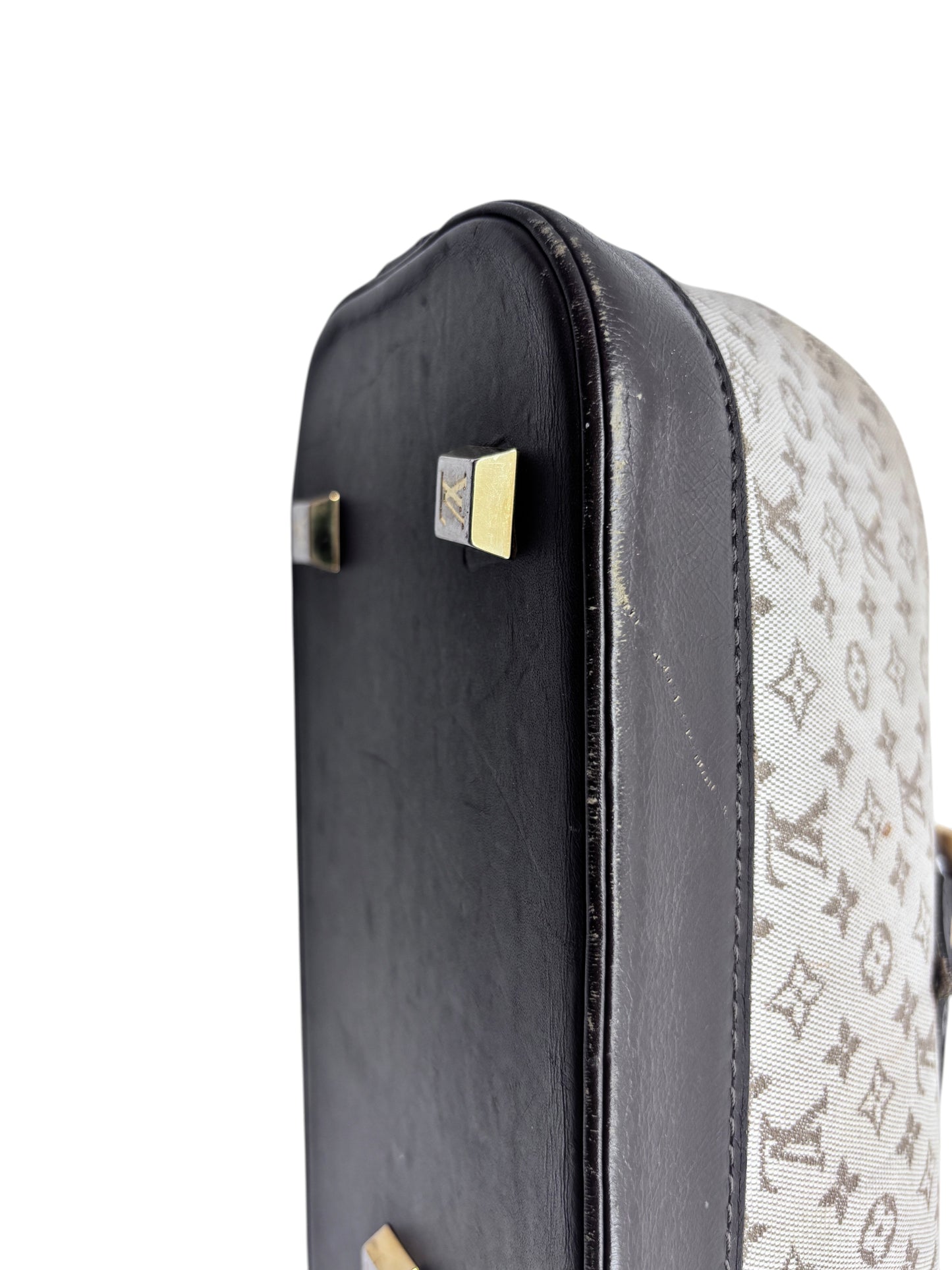 Posh Purse Co preloved Louis Vuitton Long Mini Lin bag showing the dark leather base with gold protective feet