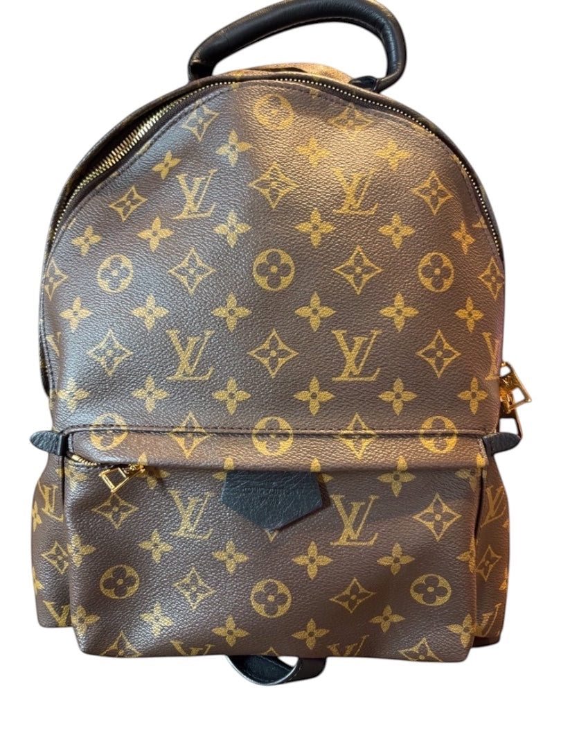Posh Purse Co Louis Vuitton Palm Springs Monogram coated canvas backpack with black leather trim and straps.
