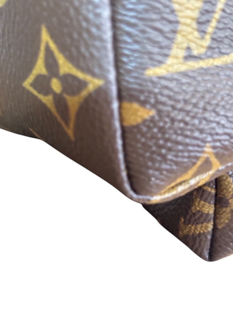 Posh Purse Co Louis Vuitton Palm Springs Monogram coated canvas backpack with leather trim and gold-tone hardware.