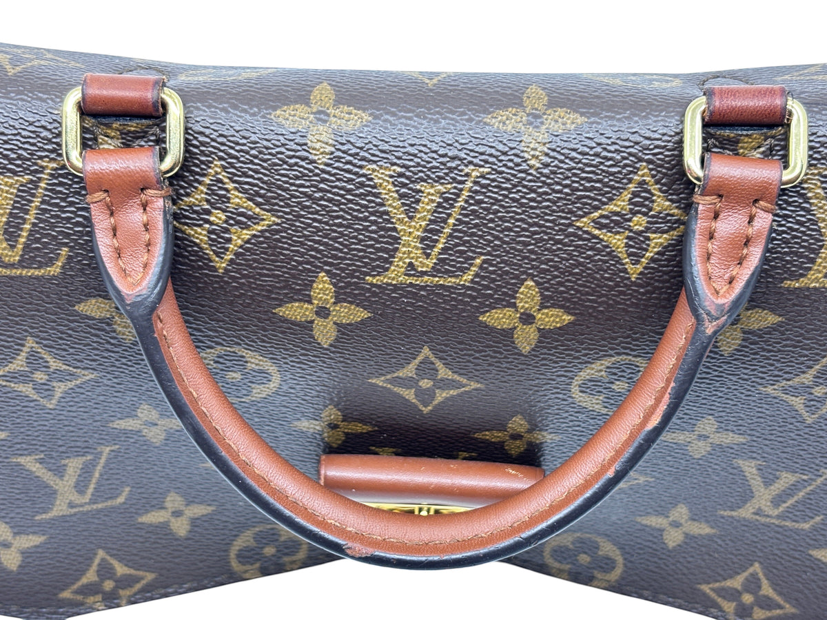 Posh Purse Co Louis Vuitton Vaugirard bag featuring iconic brown monogram canvas, leather handle, and gold hardware.