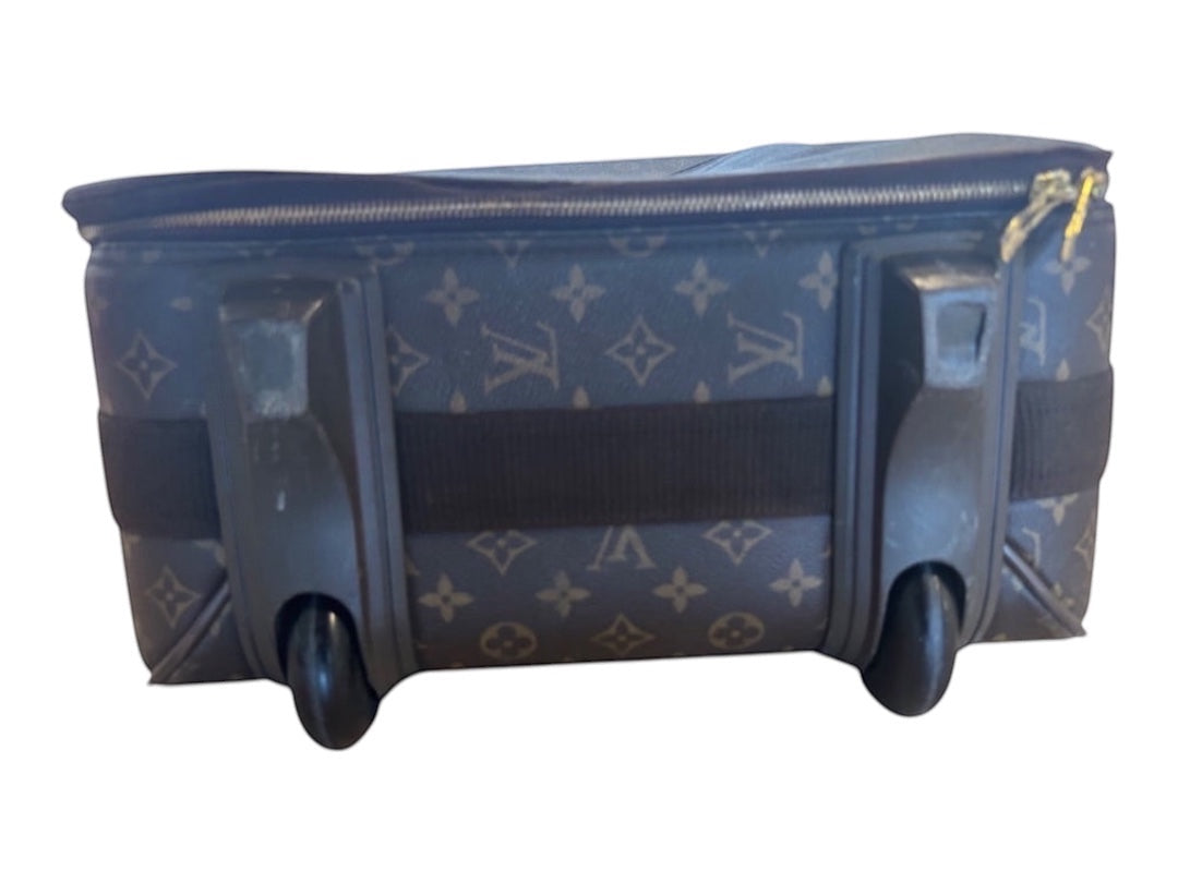 Posh Purse Co. Louis Vuitton Monogram Pegase 60 rolling suitcase with black wheels and telescopic handle.