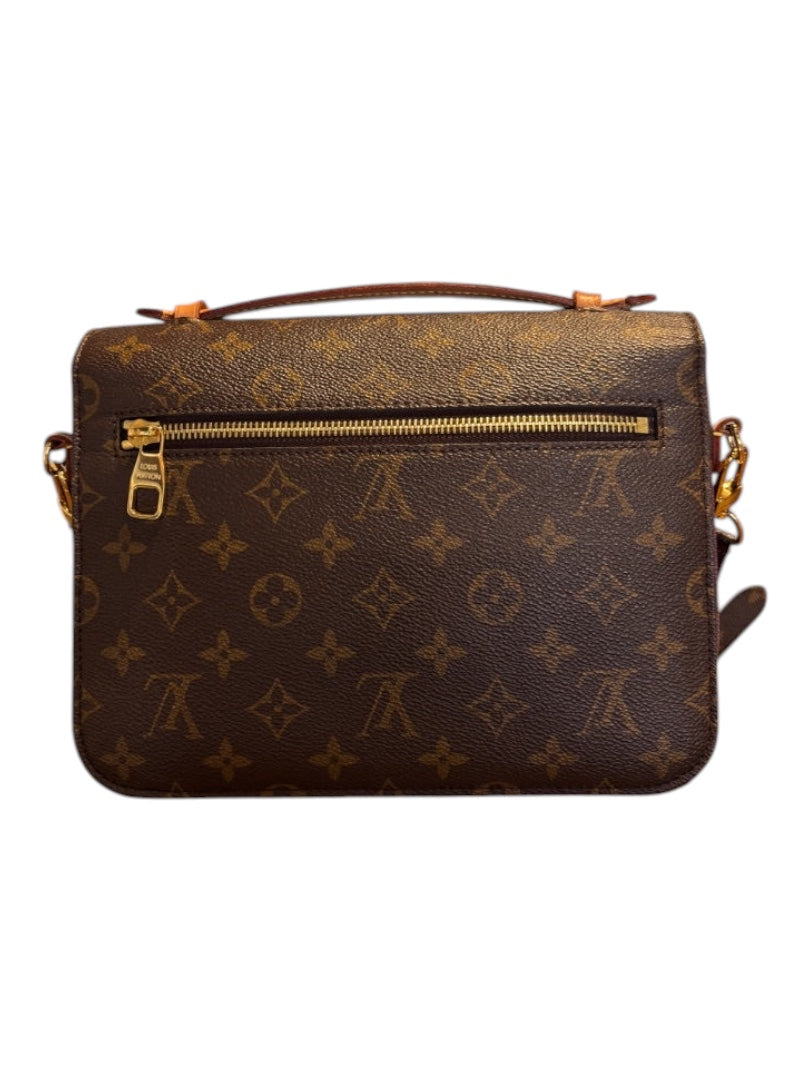 Posh Purse Co Monogram Louis Vuitton Pochette Metis crossbody bag in brown canvas with gold hardware and top handle.