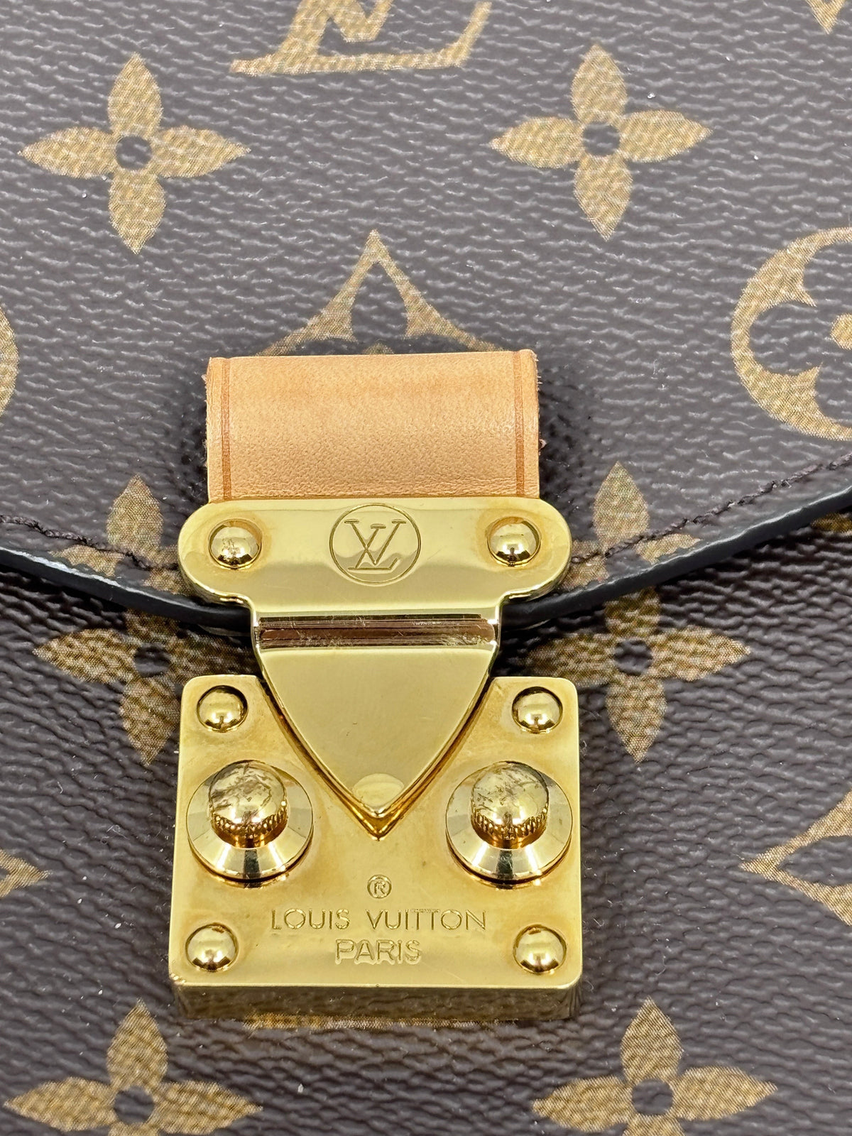Posh Purse Co Louis Vuitton Monogram Pochette Metis featuring signature gold-tone S-lock hardware on coated canvas.