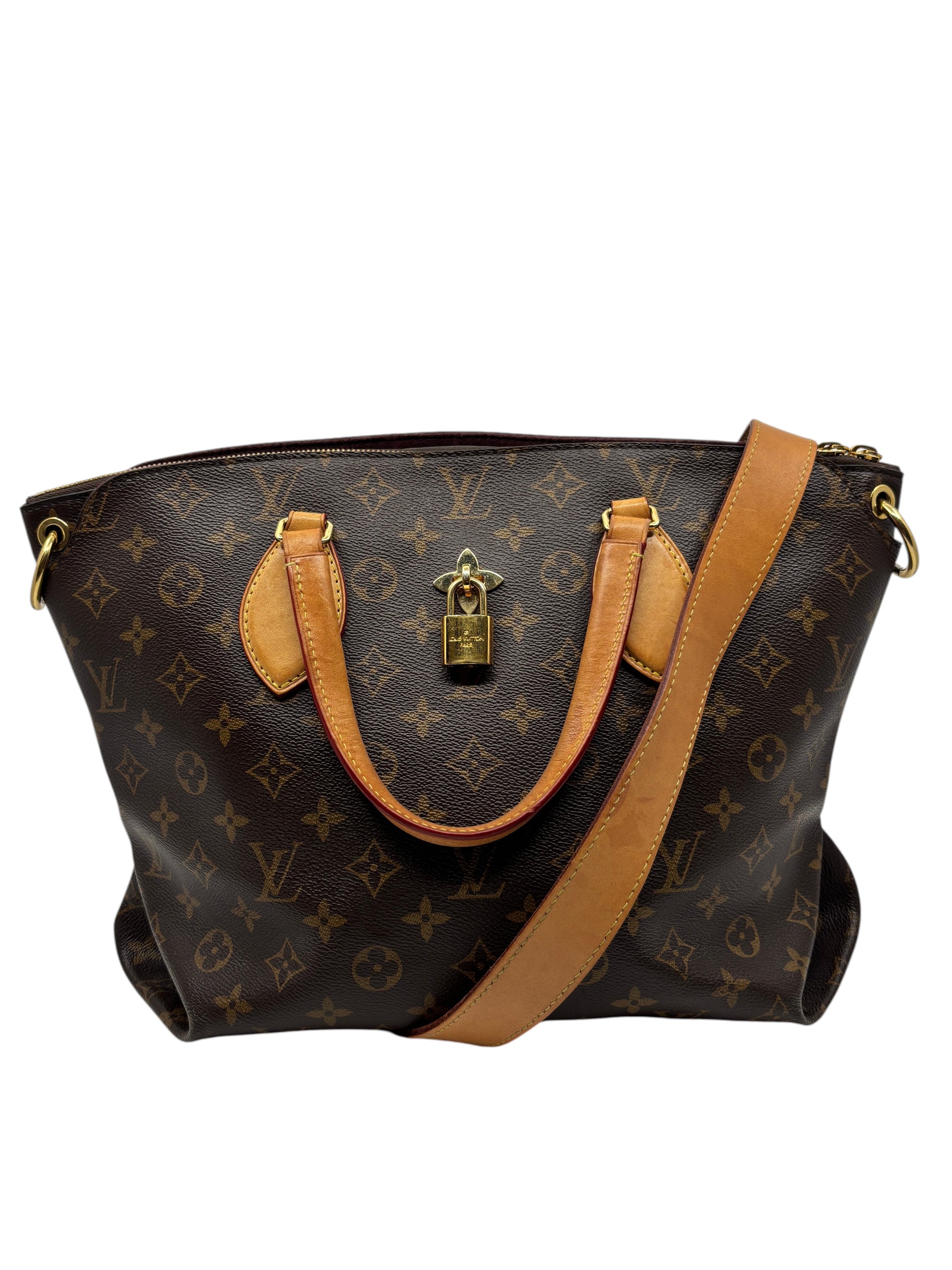 Posh Purse Co. Louis Vuitton Monogram Flower Zipped Tote with leather handles, shoulder strap, and gold padlock.