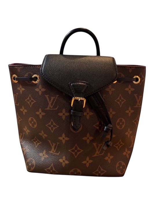 Posh Purse Co Louis Vuitton Montsouris BB backpack in Monogram coated canvas with black leather trim and gold hardware.