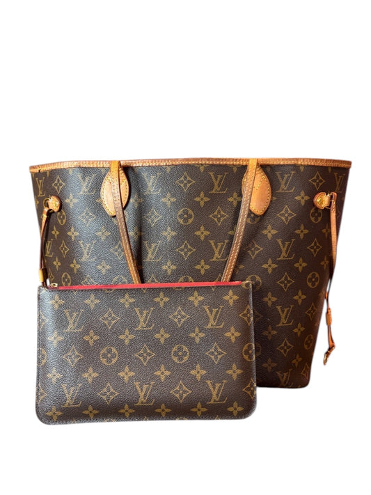 Posh Purse Co Louis Vuitton Neverfull MM Monogram tote bag with red interior and matching pouch. Coated canvas with leather trim.