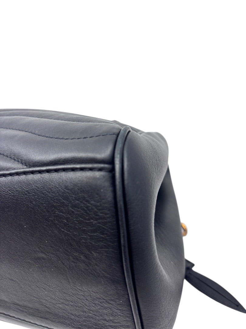 Posh Purse Co preloved black quilted leather Louis Vuitton New Wave Chain Bag side view showing surface texture