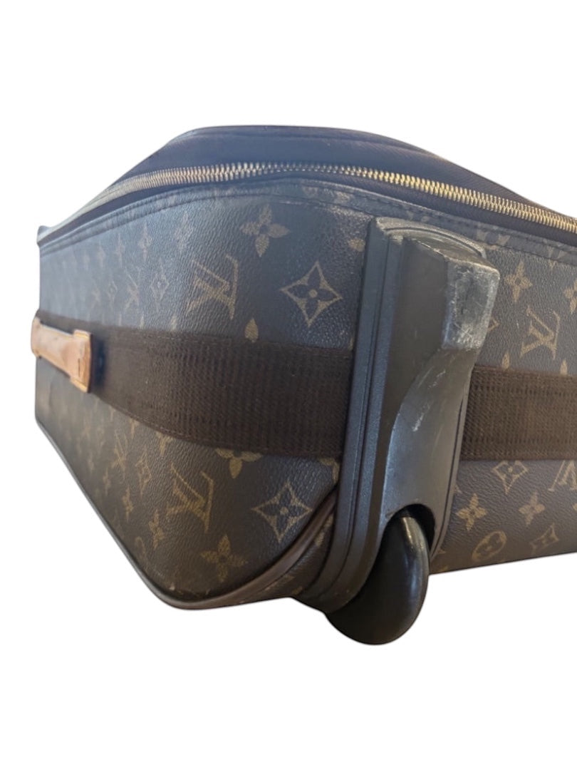 Posh Purse Co. Louis Vuitton Monogram Pegase 60 rolling suitcase with brown canvas and leather trim, showing wear.