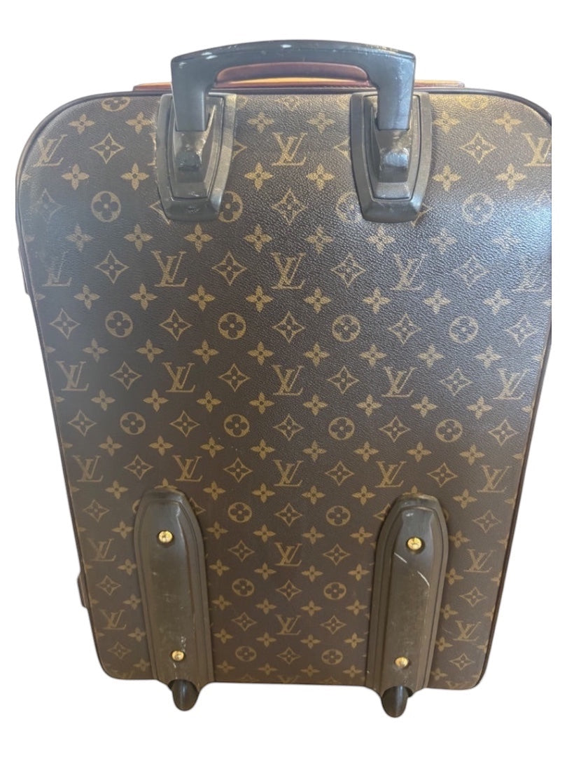 Posh Purse Co. Louis Vuitton Monogram Pegase 60 rolling suitcase with brown LV canvas and leather trim.