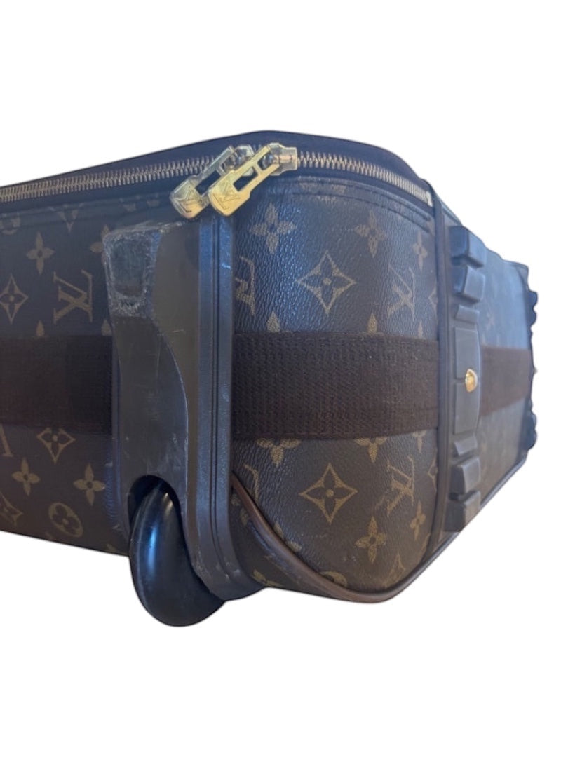 Posh Purse Co. Louis Vuitton Monogram Pegase 60 rolling suitcase with brown canvas and leather trim, showing wear.