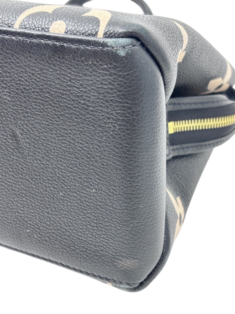 Close-up of the black leather corner and side of a Posh Purse Co Louis Vuitton Bicolor Giant Monogram Petit Palais