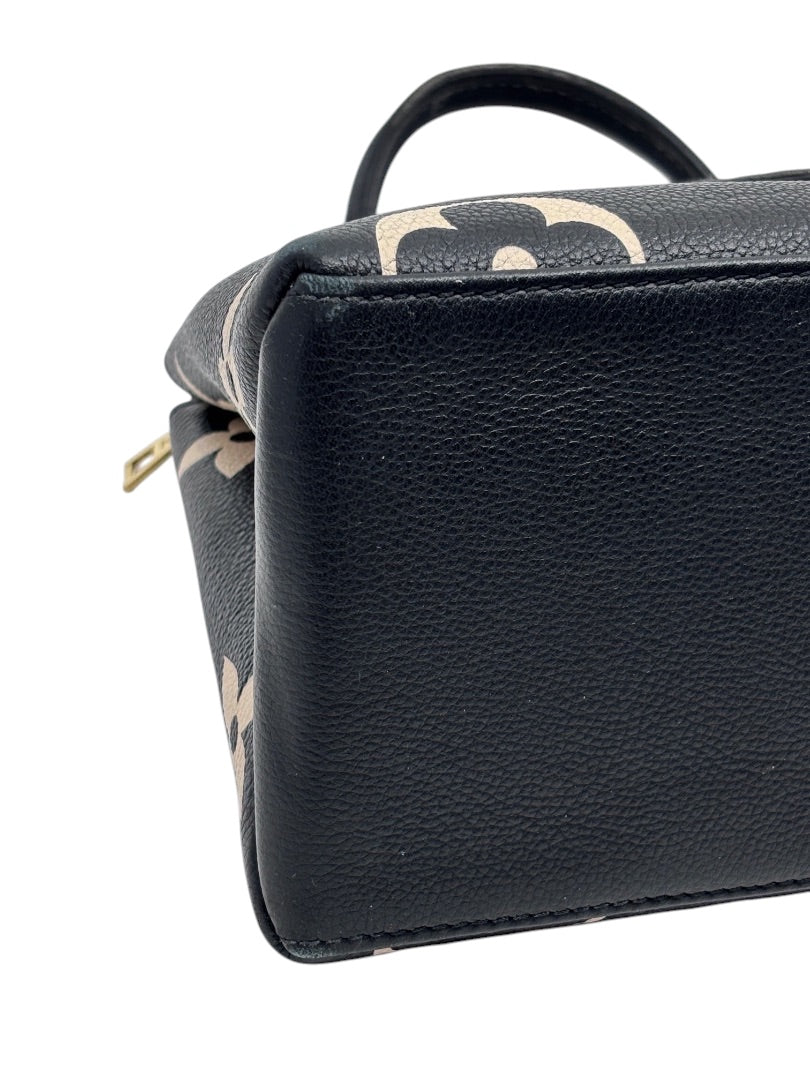 Posh Purse Co Louis Vuitton Petit Palais handbag featuring black and beige bicolor giant monogram leather detail