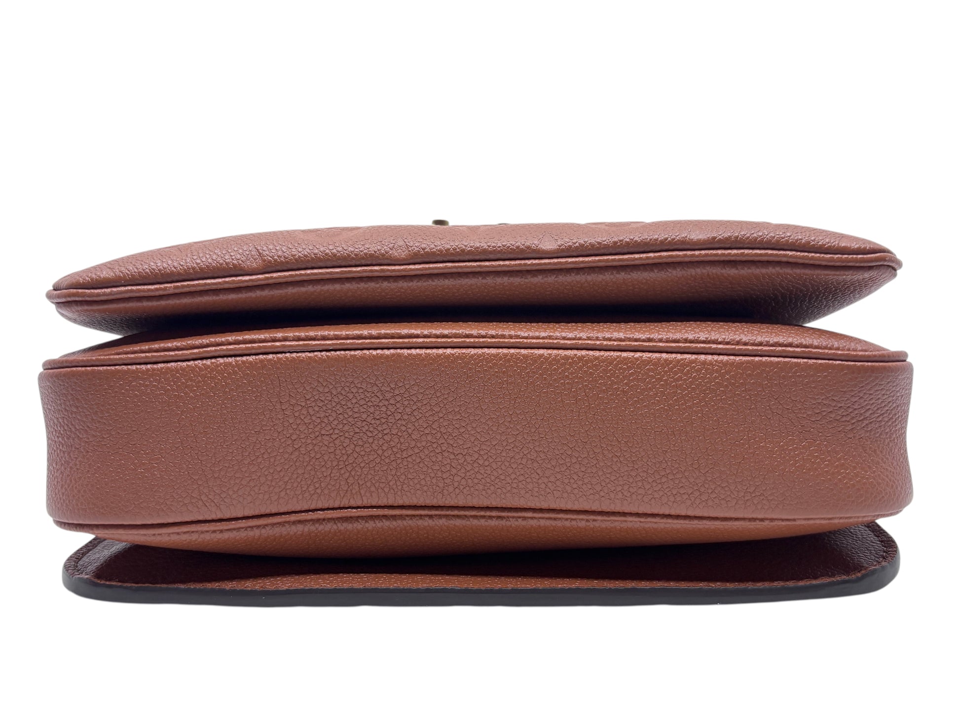 Posh Purse Co. Louis Vuitton Pochette Metis bag viewed from the side showing brown leather and monogram canvas