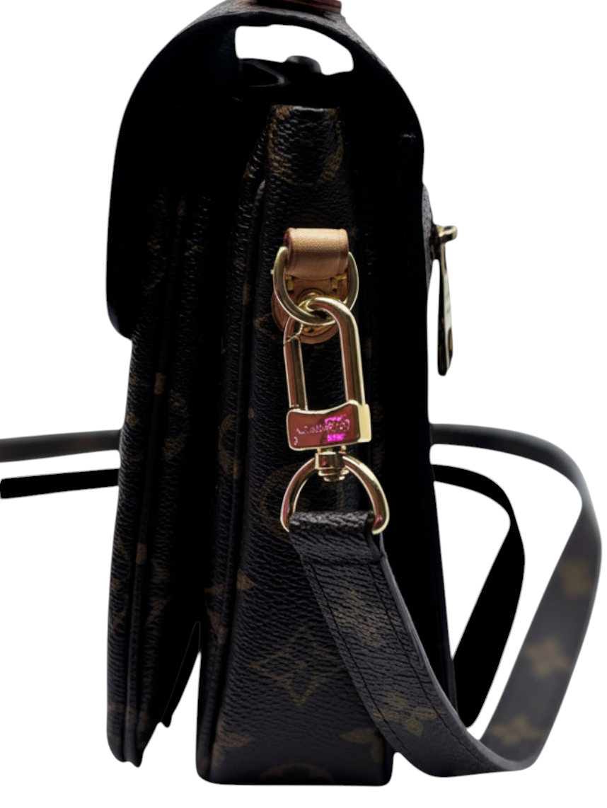 Posh Purse Co Louis Vuitton Monogram Pochette Metis side view showing gold hardware and adjustable shoulder strap