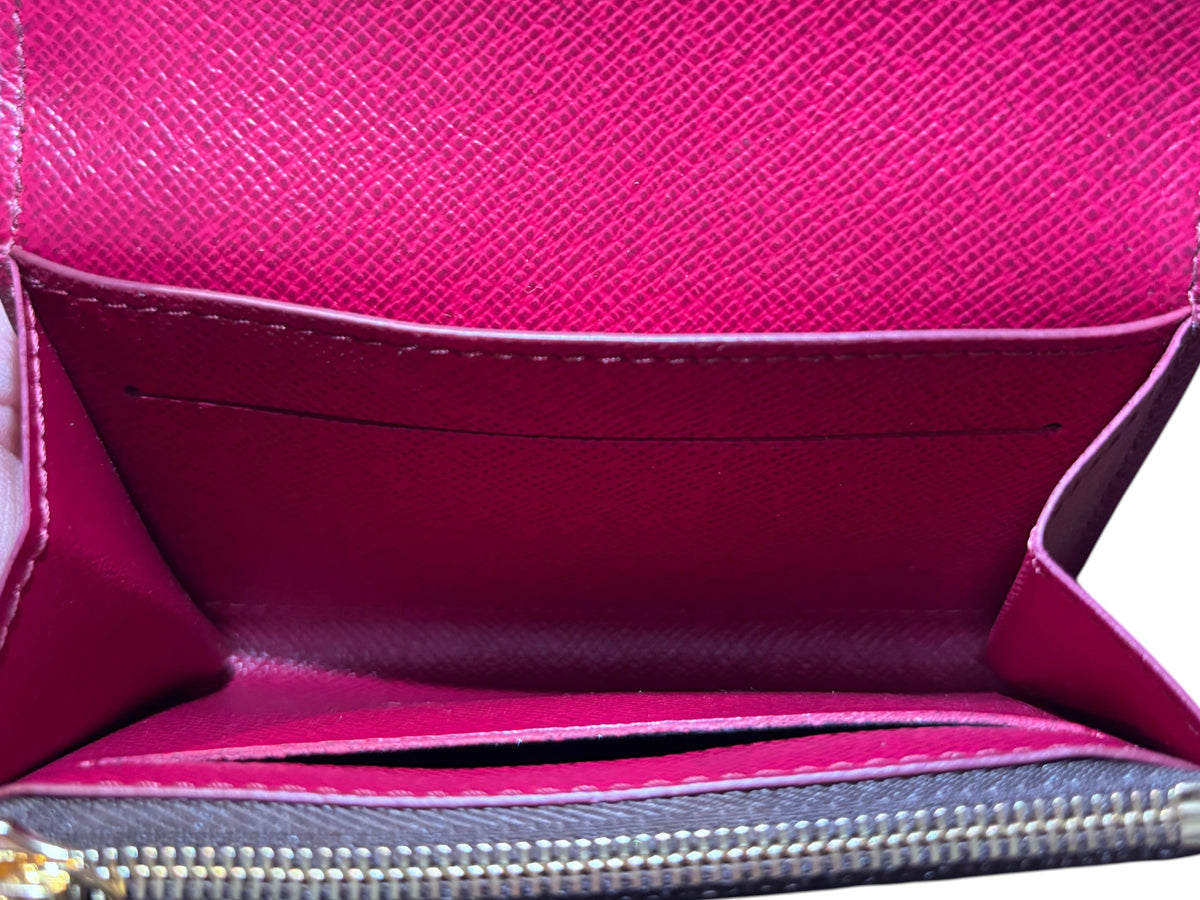 Posh Purse Co preloved Louis Vuitton Rosalie wallet interior with vibrant fuchsia leather lining and gold hardware
