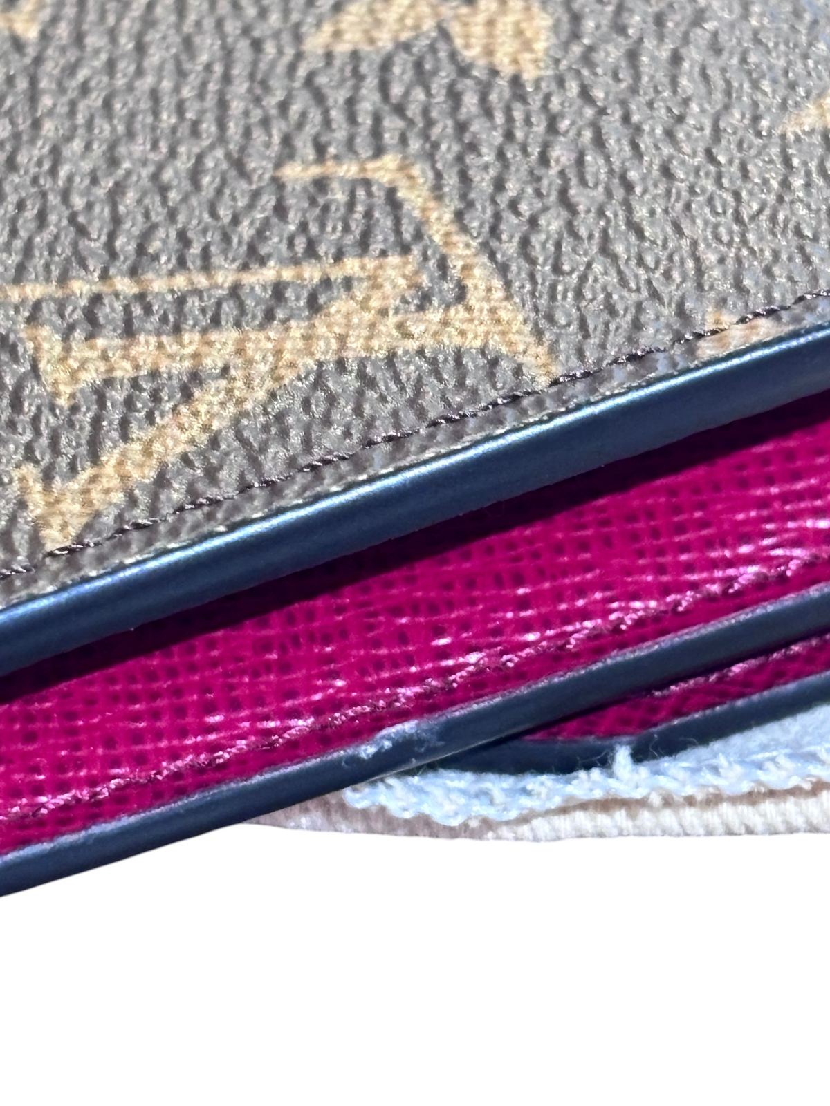 Posh Purse Co. Louis Vuitton Rosalie wallet in brown monogram canvas with a vibrant fuchsia pink leather interior.