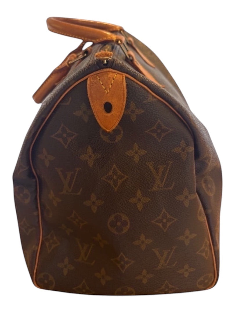 Posh Purse Co Louis Vuitton Speedy 35 monogram canvas handbag with tan leather trim and handles.