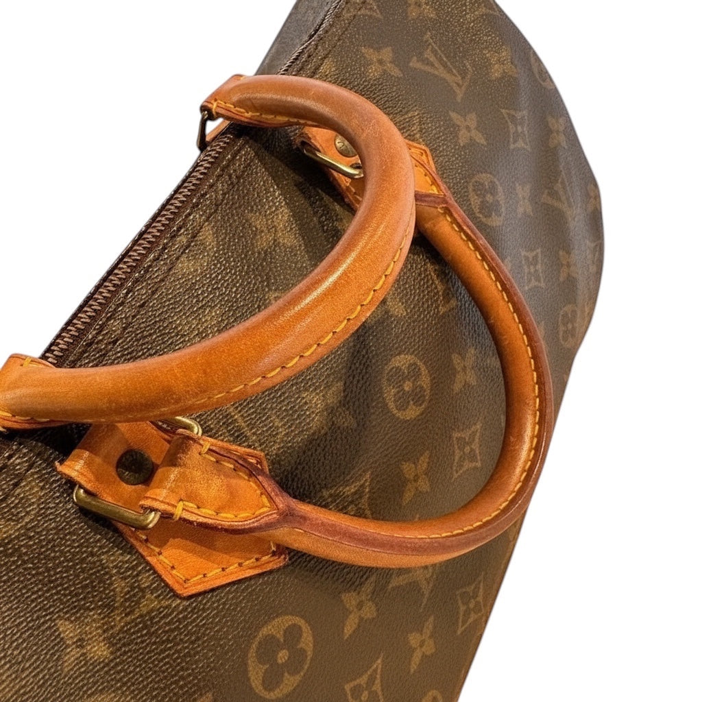 Posh Purse Co Louis Vuitton Speedy 35 monogram canvas handbag with natural vachetta leather trim and rolled handles.
