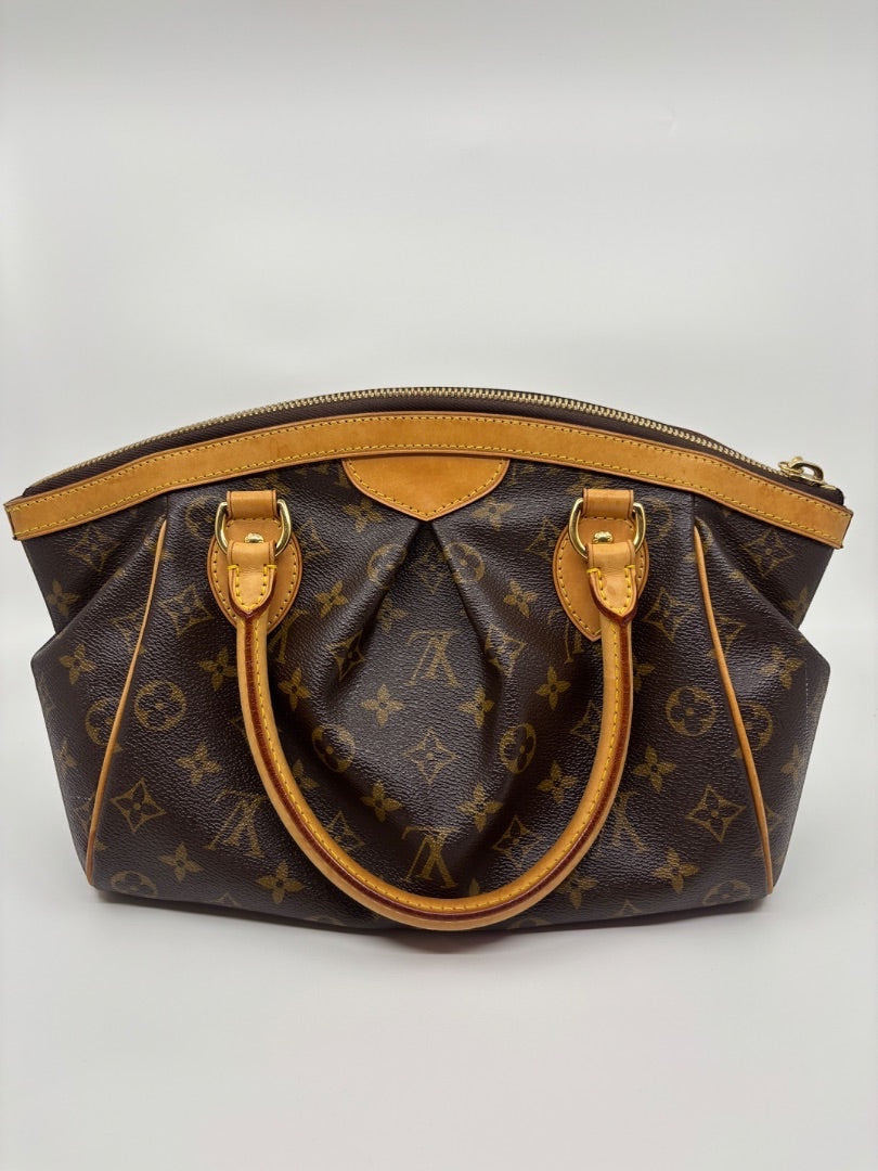 Posh Purse Co Louis Vuitton Monogram Tivoli handbag with vachetta leather trim and gold hardware.