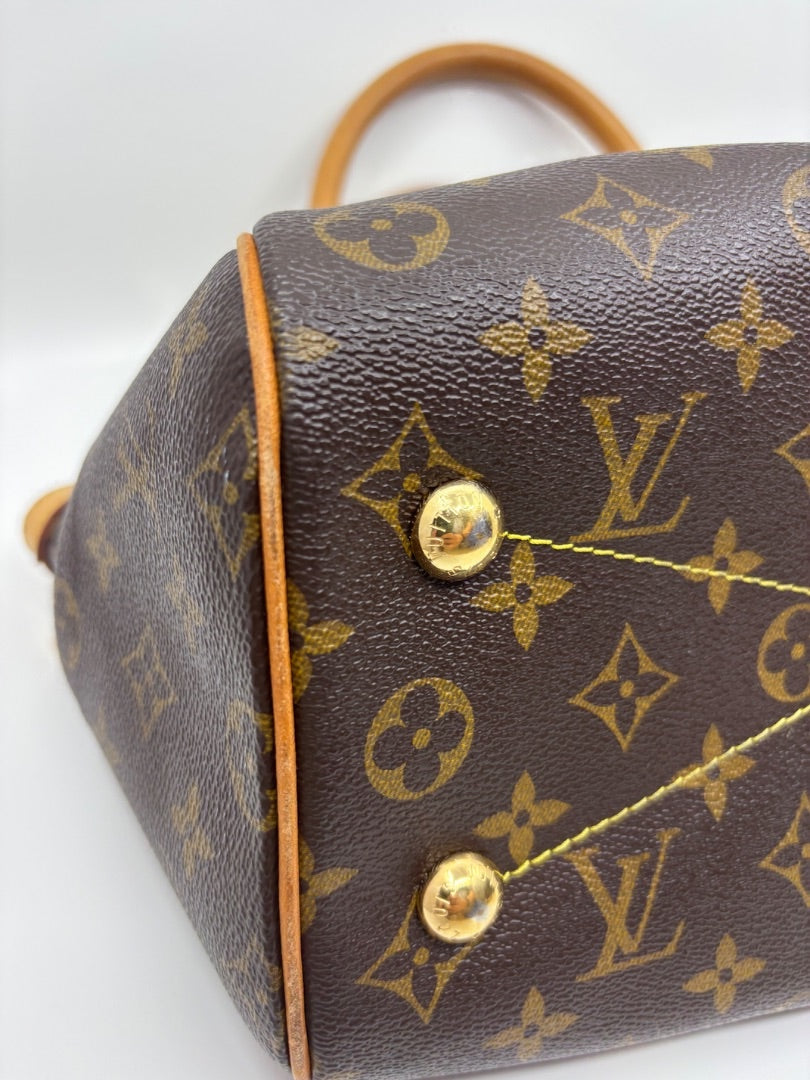 Posh Purse Co Louis Vuitton Monogram Tivoli handbag in brown canvas with gold hardware and tan leather trim.