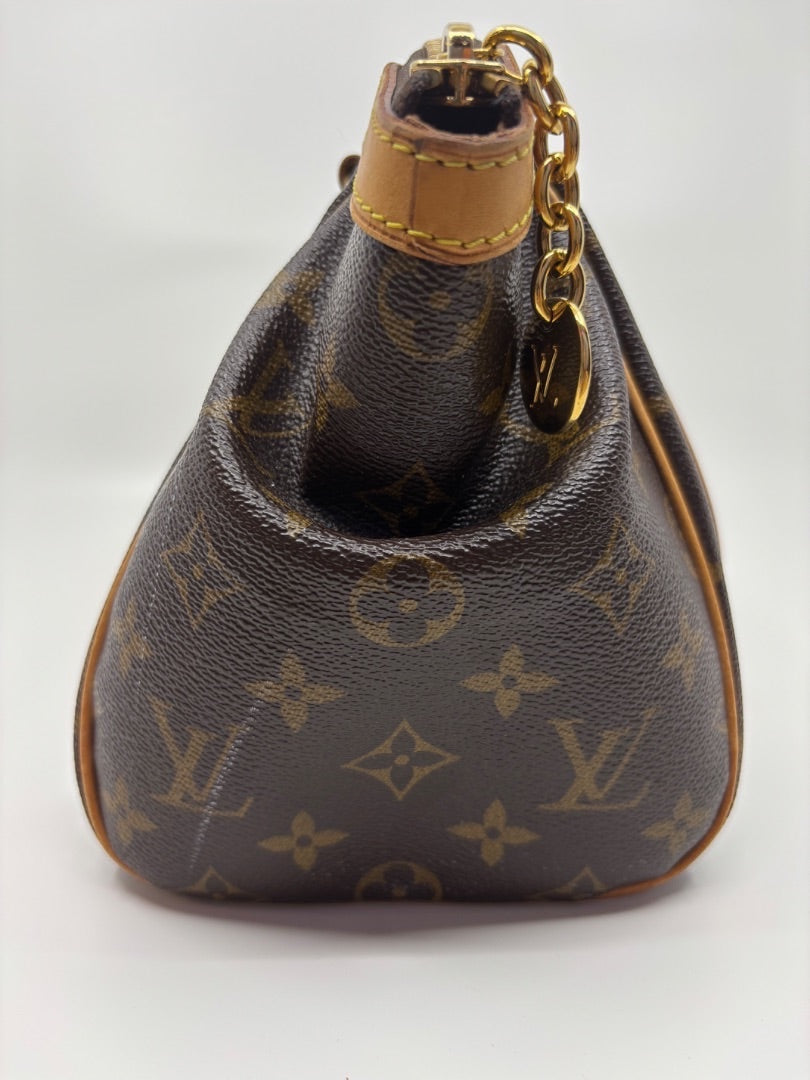 Posh Purse Co Louis Vuitton Monogram Tivoli handbag in brown canvas with tan leather trim and gold hardware.