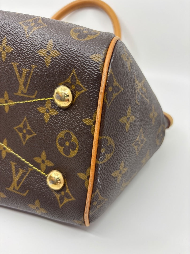 Posh Purse Co Louis Vuitton Monogram Tivoli handbag with gold hardware and vachetta leather trim.