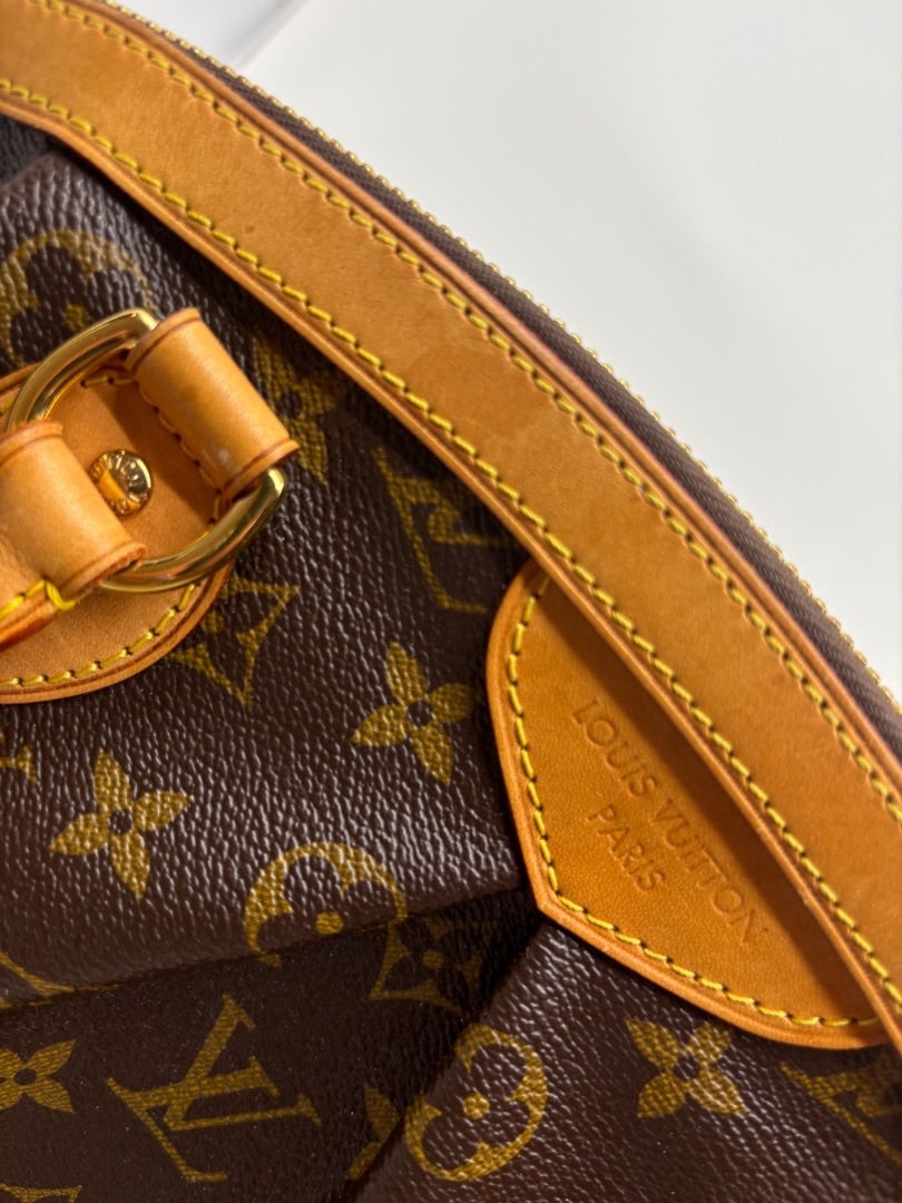 Posh Purse Co Louis Vuitton Monogram Tivoli handbag with gold hardware and vachetta leather trim.