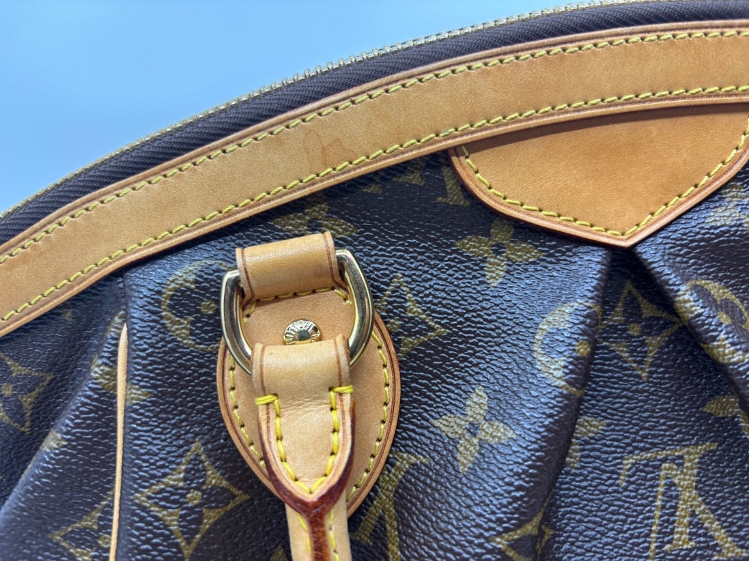 Posh Purse Co Louis Vuitton Monogram Tivoli handbag with vachetta leather trim and gold-tone hardware.