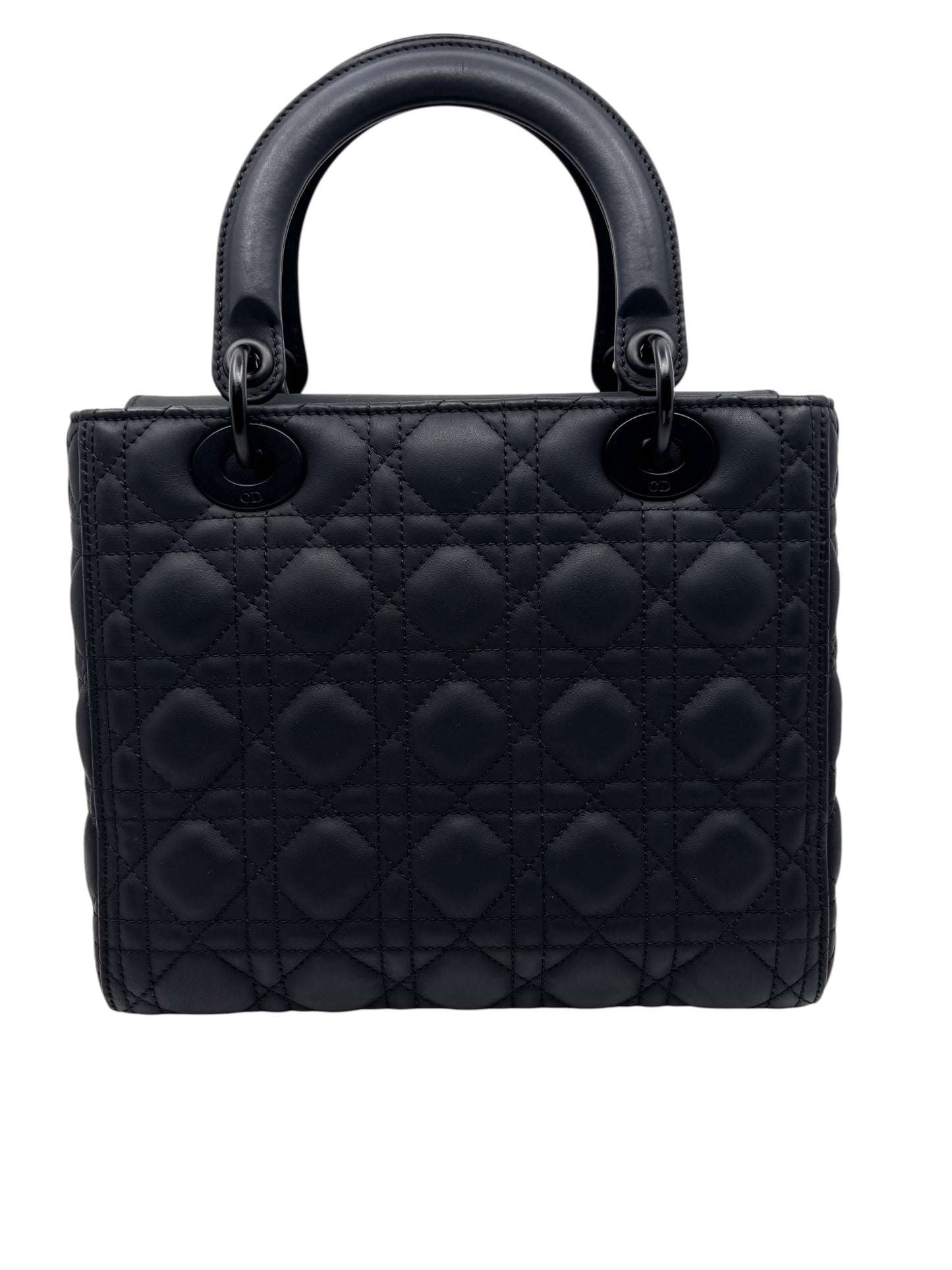 Posh Purse Co. medium Lady Dior bag in matte black leather with signature cannage quilting and structured top handles.