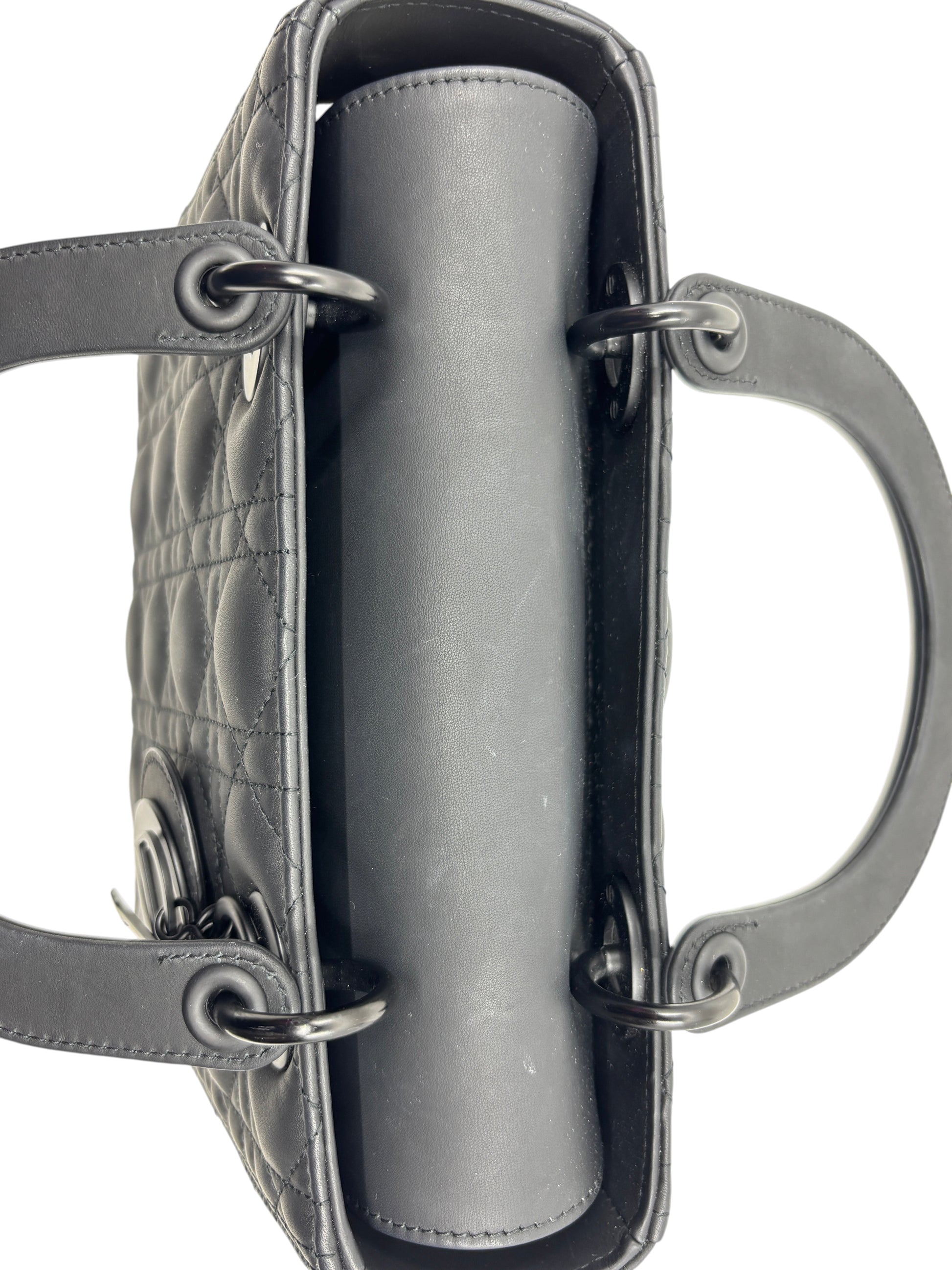 Posh Purse Co. matte black Lady Dior medium bag featuring signature cannage quilting and top handles