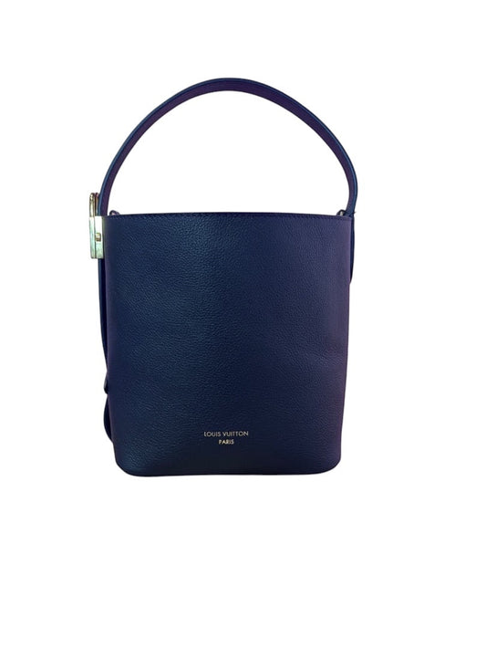 Posh Purse Co. navy blue Louis Vuitton Lowkey Carryall handbag in pebbled leather with gold hardware and embossed logo.