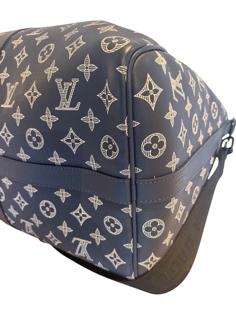 Posh Purse Co navy Louis Vuitton Monogram Shadow calfskin leather Keepall 50 travel bag with embossed pattern.