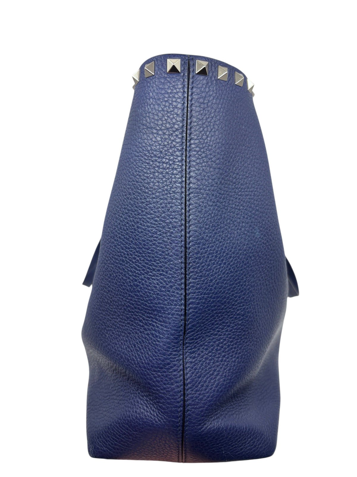 Posh Purse Co navy grained calfskin Valentino Rockstud tote bag side view showing signature metal stud hardware