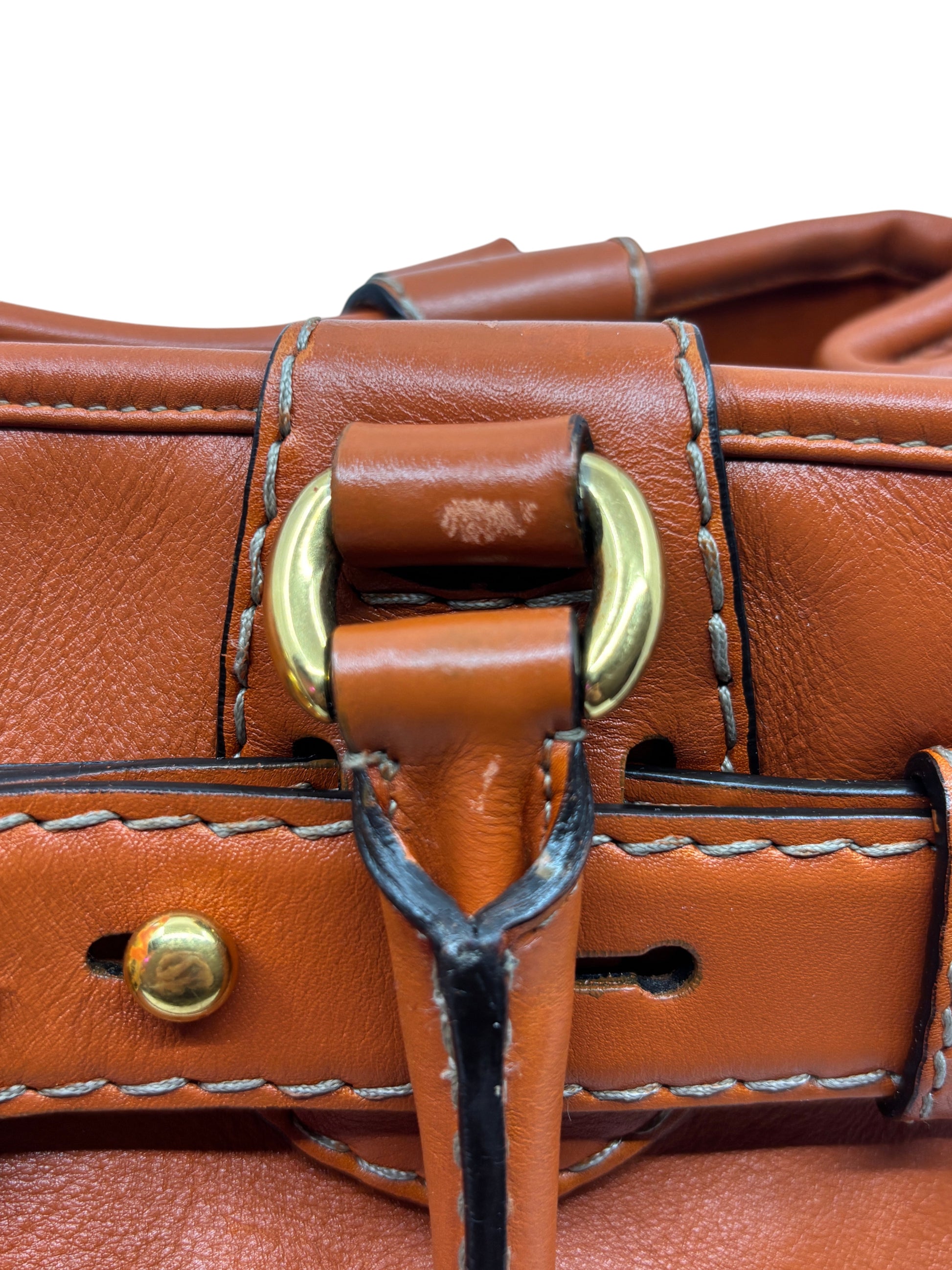 Posh Purse Co. preloved orange Gucci GG Running tote bag featuring gold-tone hardware and detailed leather stitching.