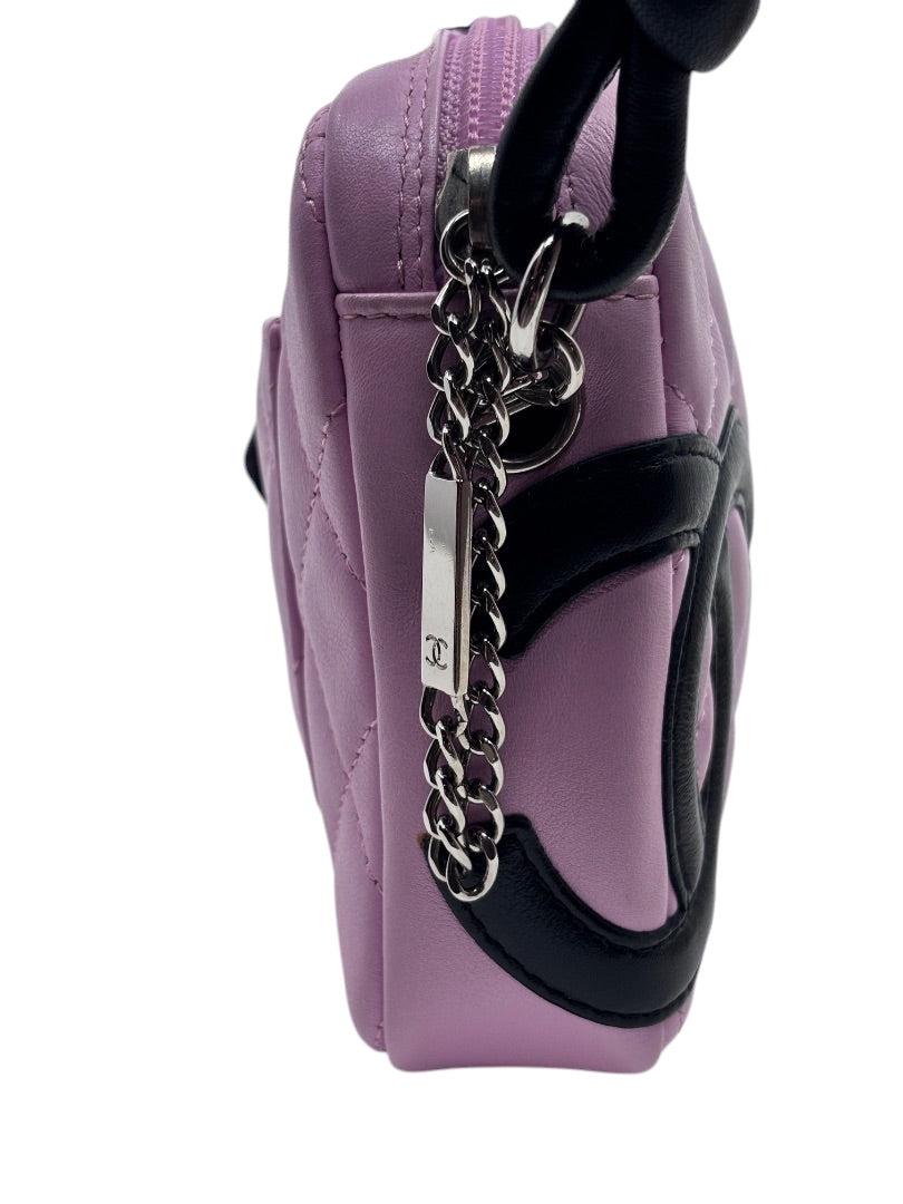 Posh Purse Co vintage Chanel Cambon Ligne bag in pink quilted leather with black CC logo and silver chain detail