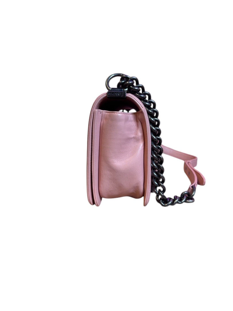 Posh Purse Co. Pink Chanel Boy Bag, medium size, crafted from leather with antique-style hardware and a chain strap.